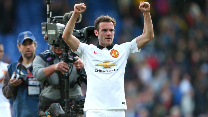 Bid on a hand-signed Juan Mata Manchester United jersey